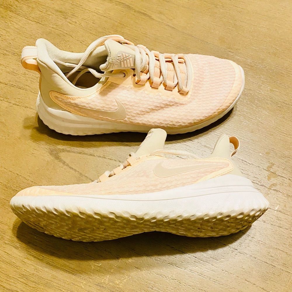 Light pink Nike Renew training shoes